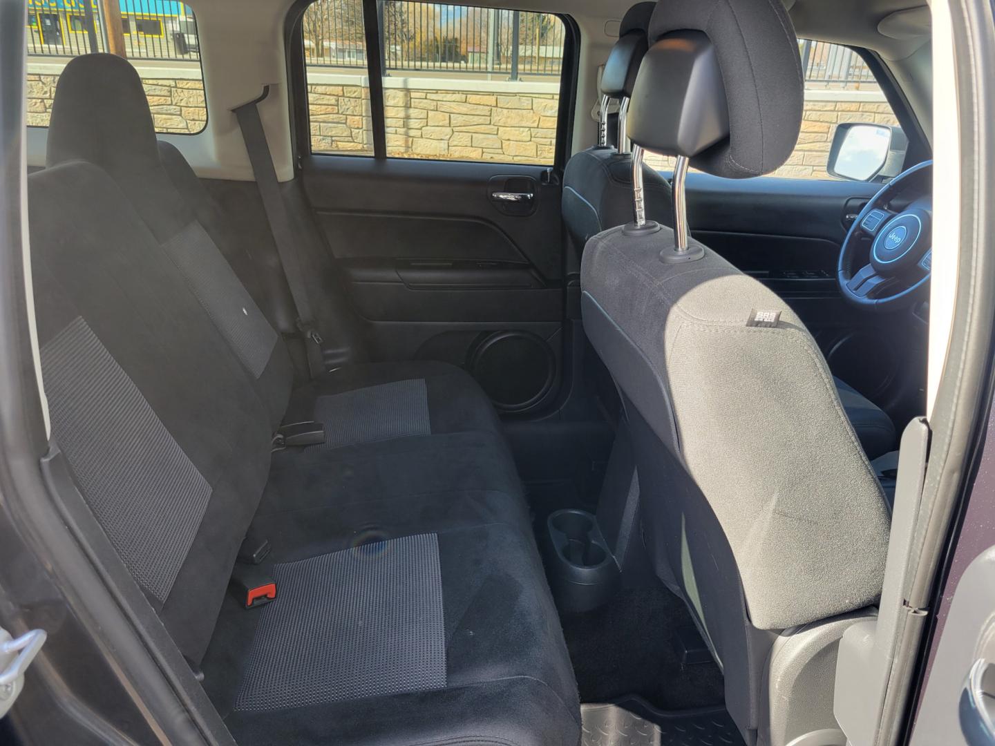2014 Blue /Black Jeep Patriot Latittude (1C4NJRFB7ED) with an 2.4L I4 engine, 6 Speed Automatic transmission, located at 450 N Russell, Missoula, MT, 59801, (406) 543-6600, 46.874496, -114.017433 - Photo#7